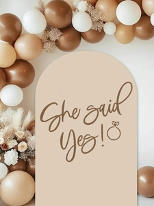 Close-up of brown arch wall sticker with She Said Yes text for romantic bedroom decor