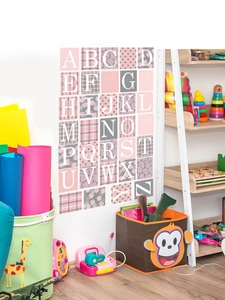 Detail of A-Z alphabet wall decals with pink and grey patterns for kids room decor