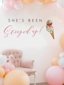 Detail of bridal ice cream wall sticker with She's Been Scooped Up text and balloons