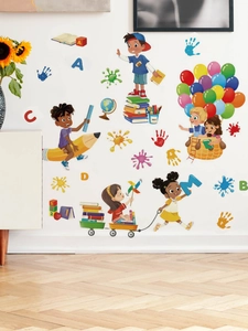 Detail of colorful PVC wall decals showing diverse children and educational motifs