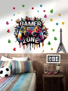 Detail of colorful Gamer Zone wall decal with graffiti controller in a boy's bedroom