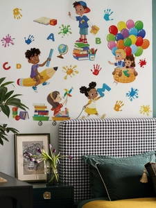 Kids wall stickers with cartoon children and school supplies on bedroom white wall