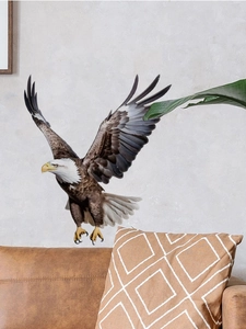 Detailed realistic eagle wall sticker with feathers displayed above a modern sofa