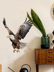 Detail of a majestic bald eagle wall decal with dark brown feathers on a beige wall