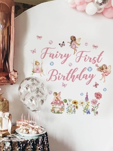 Detailed view of fairy first birthday wall decals with pink floral butterfly motifs