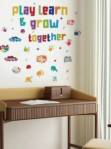 Détail des stickers muraux colorés Play Learn & Grow Together pour chambre d'enfant