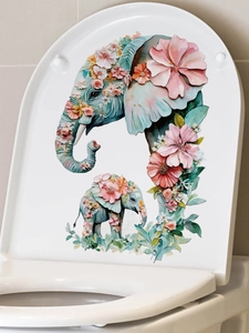 Detailed view of floral elephant decals applied to a white ceramic toilet lid