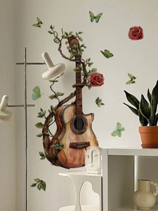 Detail of guitar wall sticker with green vines and red roses in a modern living room