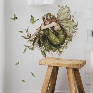 Green butterfly fairy wall sticker for bedroom with floral design on white wall