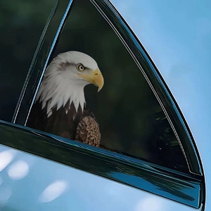 Realistic bald eagle head car window sticker creating a creative visual illusion effect
