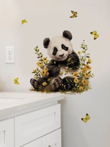 Detail of cute panda and yellow sunflower wall decals on a clean white bathroom wall