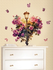 Macro detail of vintage street lamp wall sticker with purple flowers and butterflies