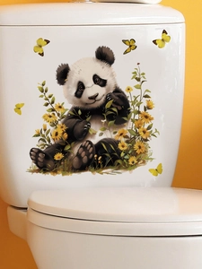 Detail of cute panda and butterfly wall sticker applied on a white ceramic toilet tank