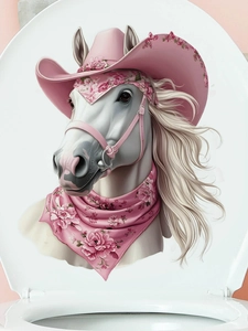 Dettaglio adesivo con cavallo bianco e cappello rosa su un copriwater bianco