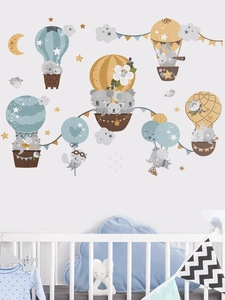 Detail of cute animal balloon wall stickers featuring koala and elephant in nursery
