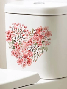Pink cherry blossom heart wall sticker applied to a clean white surface