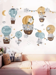 Nursery room scene with cute cartoon balloon animal wall stickers in soft Morandi colors