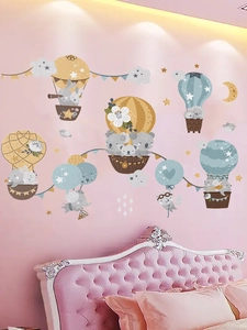 Detail of cute animal balloon wall stickers on a pink bedroom wall for kids nursery