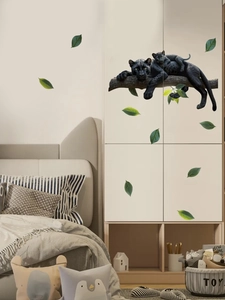 Detail of realistic black panther wall stickers applied on white wardrobe doors