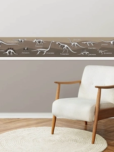 Close-up of dinosaur fossil wall border sticker showing T-Rex skeleton in a kids' nursery room