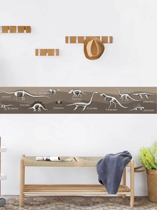 Detailed fossil dinosaur wall border sticker showing various prehistoric skeletons on white wall