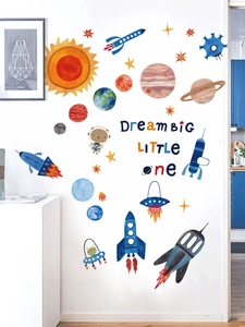 Space rocket wall stickers featuring stars and planets for nursery decor with Dream Big text