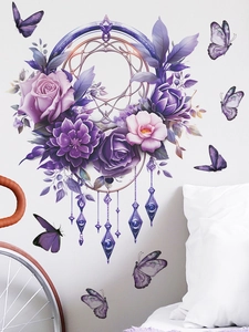 Detail view of purple dreamcatcher wall sticker with floral patterns and butterflies