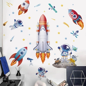 Cartoon astronaut and space rocket wall decals for kids bedroom decor on white wall