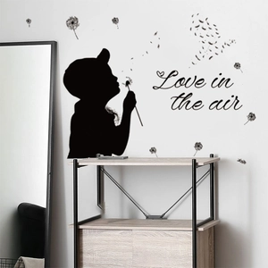 Sticker mural pissenlit garçon avec texte Love in the air pour déco salon moderne