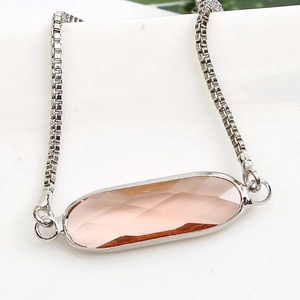 Adjustable silver bracelet featuring a long oval pink crystal and box chain design