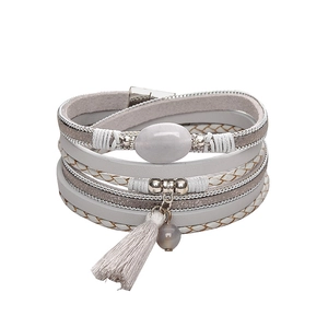 Detail of bohemian multilayer leather bracelet with grey stone and magnetic clasp