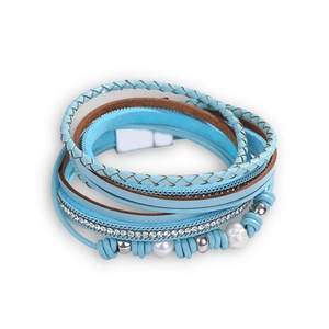 Detail of multi-layer wrap bracelet with blue leather, pearls, and magnetic clasp