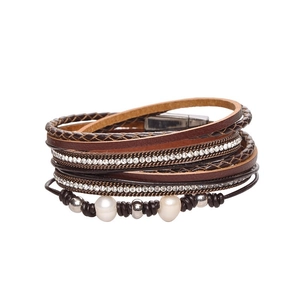 Multilayer bohemian wrap bracelet with pearls and crystals on a brown leather cord