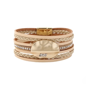 Detail of multi-layer leather wrap bracelet with sparkling rhinestones and magnetic gold clasp