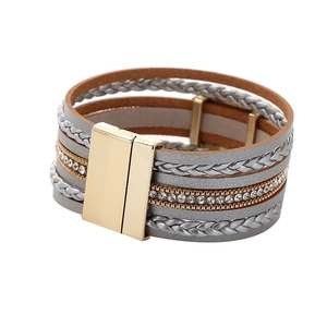 Detail of multi-layer wrap bracelet with rhinestones and golden magnetic clasp