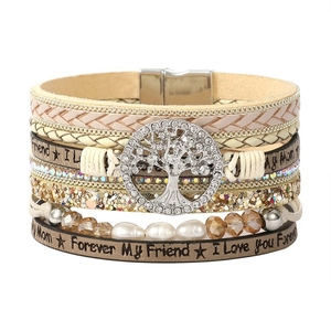 Detail of multi-layer leather bracelet with tree of life charm and crystal rhinestones