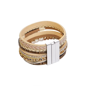 Detail of multi-layer leather bracelet with pearls, rhinestones and magnetic clasp