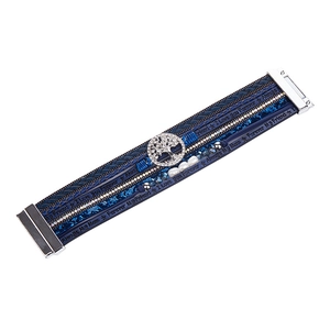 Detail of blue leather wrap bracelet with crystal tree of life pendant and magnetic clasp