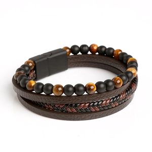 Détails de perles en œil de tigre et bracelet en cuir tressé avec fermoir magnétique