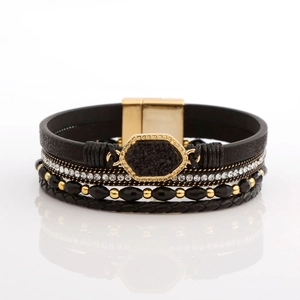 Close-up of multilayer leather bracelet with sparkling rhinestones and black druzy stone