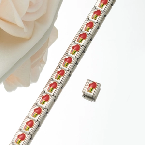 Close-up of modular Italian charm bracelet with red heart and rainbow enamel link