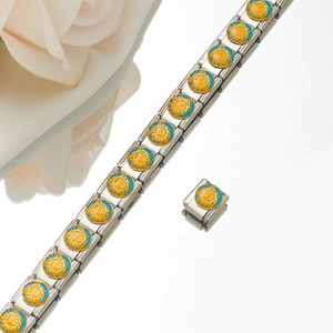 Macro shot of stainless steel Italian charm bracelet with a yellow sun smiley face link