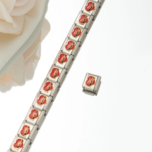 Detail of Italian charm bracelet link with red enamel heart and Daughter gold text