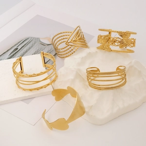 Gold-plated stainless steel open bangles set featuring butterfly and heart patterns