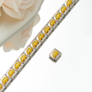 Modular stainless steel link bracelet featuring a yellow school bus enamel charm link