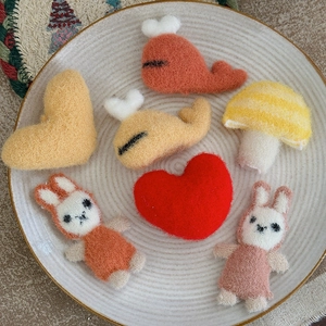 Handmade wool felt DIY accessories including cute rabbits, whales and mushroom decorations