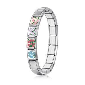 Detail of Italian charm bracelet links featuring colorful enamel floral tulip patterns