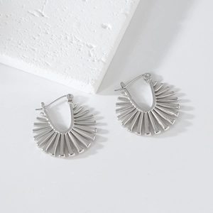 Minimalist silver irregular sunburst hoop earrings with polished radial design