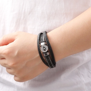 Bracelet pour homme en cuir noir multicouche avec motif œil et fermoir magnétique