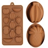 Macro detail of the brown silicone mold featuring strawberry and pineapple shapes